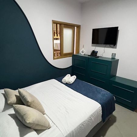 Hotel Chromatic Guatape Bagian luar foto
