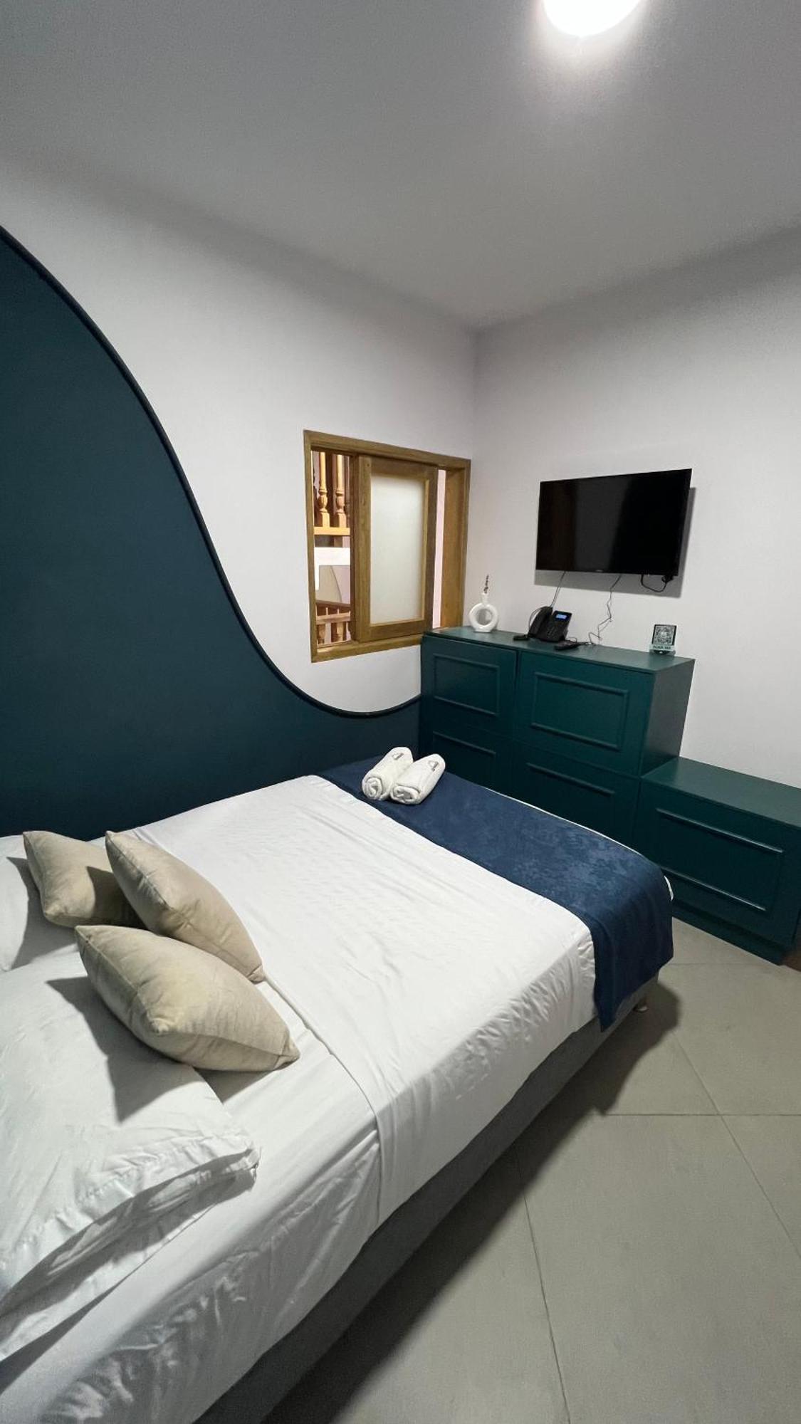 Hotel Chromatic Guatape Bagian luar foto